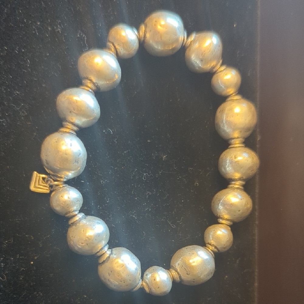 Silver Bracelet with Classic Beaded Design